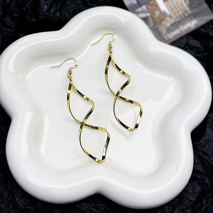 Golden Spiral Earrings | Gold