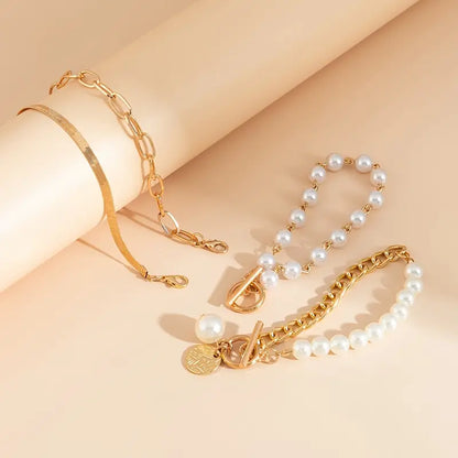 4-Piece Bracelet Set – Snake, Pearls & Links | Gold